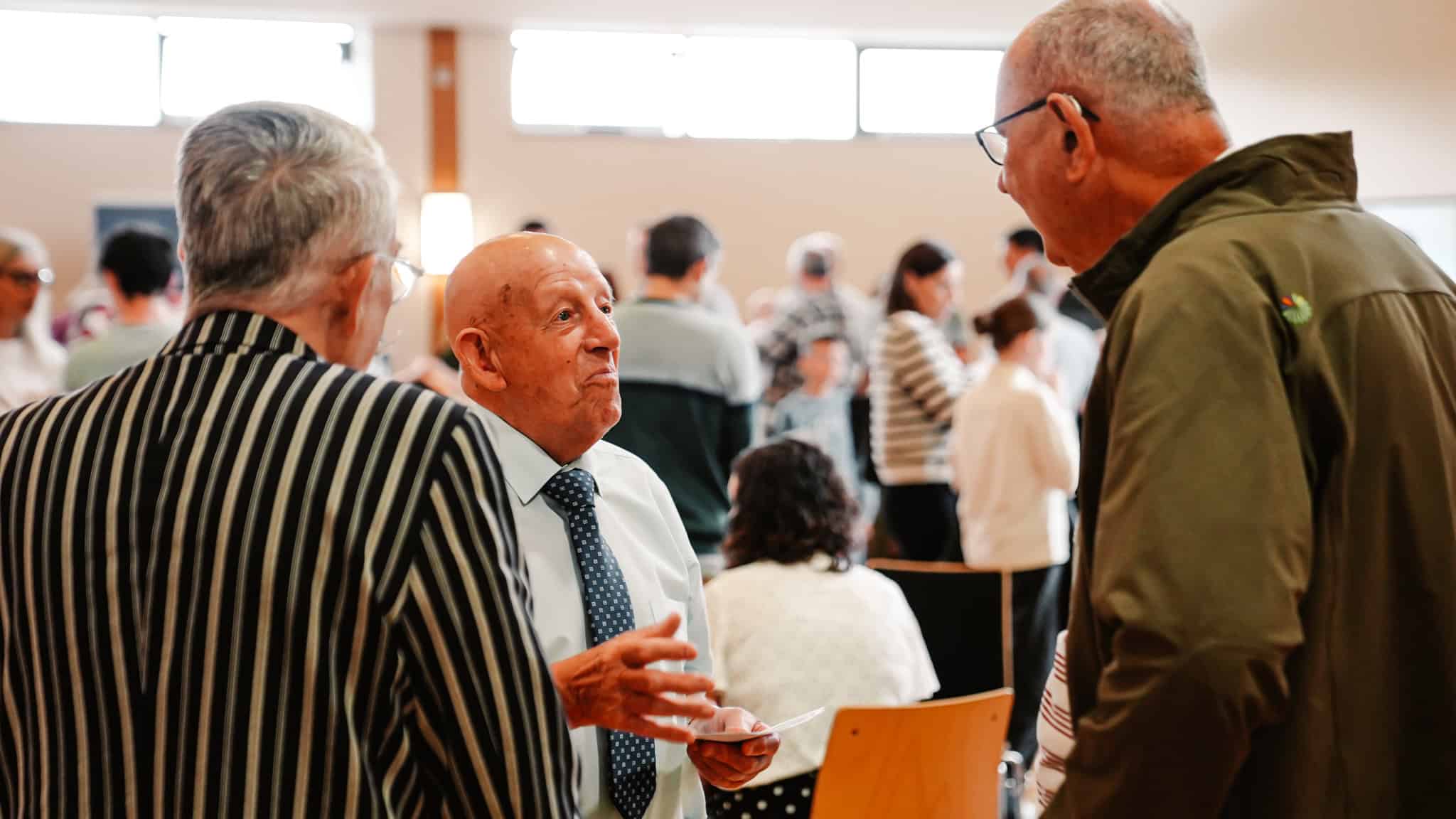 Community members engaging at Wellington Presbyterian Church event.